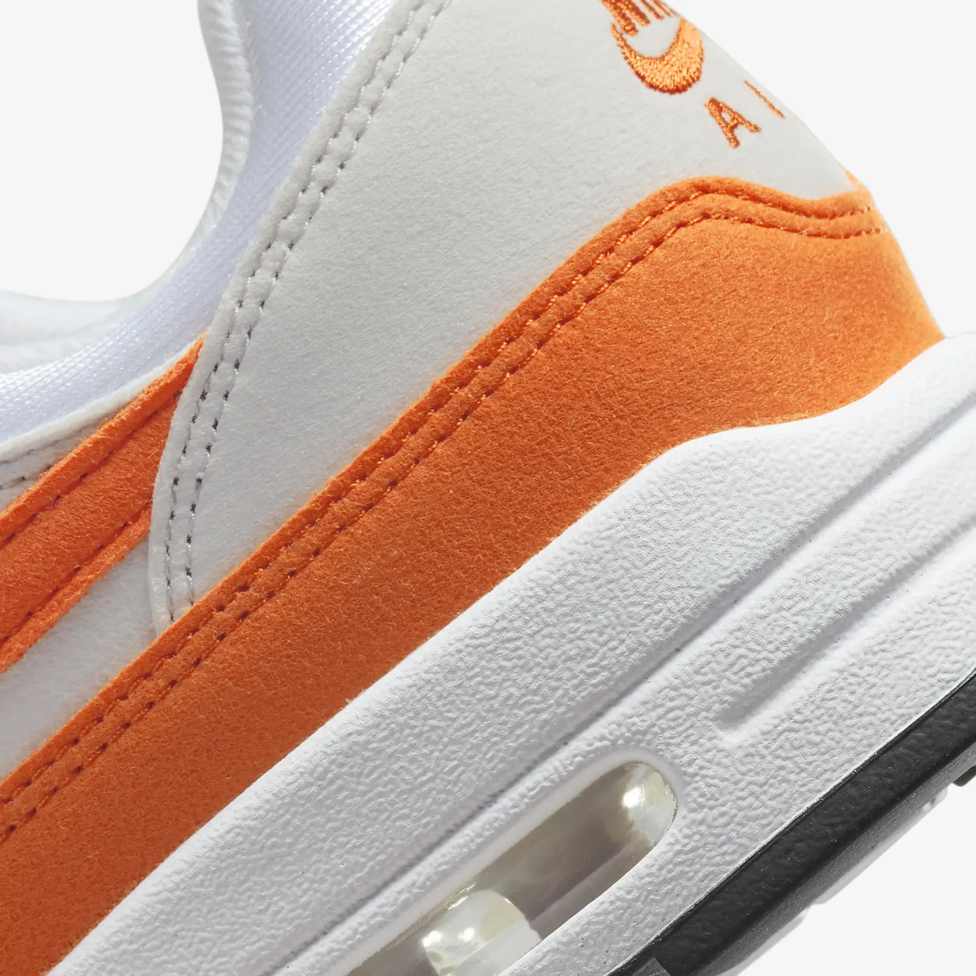 Nike | WMN'S AIR MAX 1  { NEUTRAL GREY/SAFETY ORANGE-WHITE-BLACK